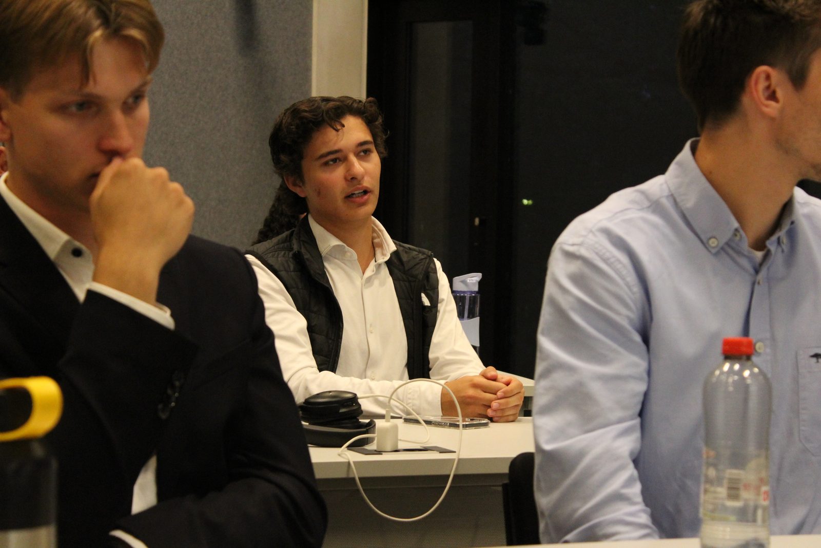Fundamentals analysts discussing a stock pitch